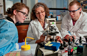 Megan Mauriello ’19, Laurie Caslake, and Nick Grams ’19