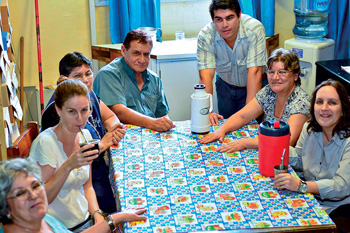 Prof. Rebekah Pite shares a round of maté with the  archivists and librarians at the Archivo General de la Gobernación de Misiones in October 2015.