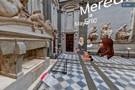 Prof. Eric Hupe leads a VR discussion of the sculptures using a laser pointer to highlight certain features.