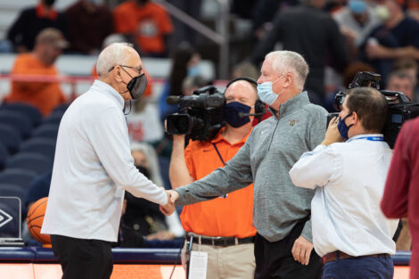 Fran O’Hanlon shakes hands on the court