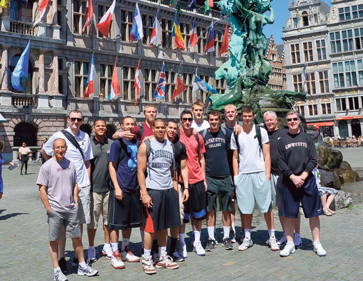 While in Europe the men’s basketball team (above) visited Antwerp’s central square and its monument honoring the city’s mythical hero, Silvius Brabo, and the field hockey team enjoyed time along the River Thames in London.