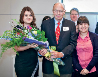 Walter Oechsle ’57 meets with two of his scholarship recipients.
