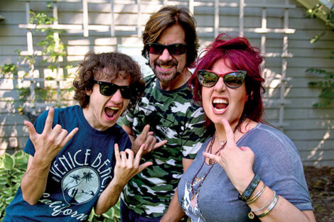 Dawn Botti, her son, and husband wear sunglasses and make 