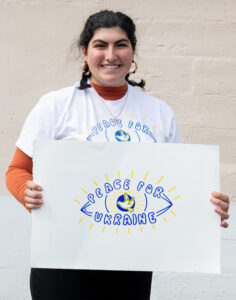 Alexandra Kasparian ’22 with her “Peace for Ukraine” design